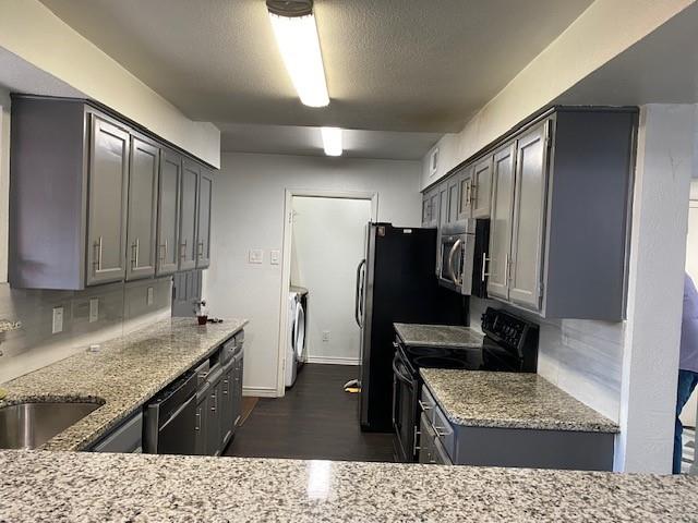 2315 Jimmydee Drive Irving, TX 75060 - Photo 8 of 14 a kitchen with a refrigerator and a sink