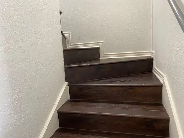 a bathroom with a toilet and a sink