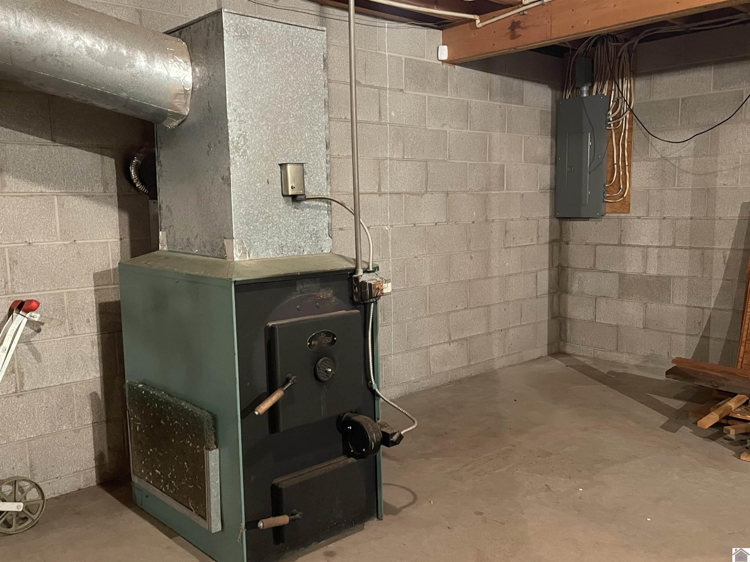 868 South Tanyard Road Cadiz, KY 42211 - Photo 26 of 37 Wood Burner in Basement