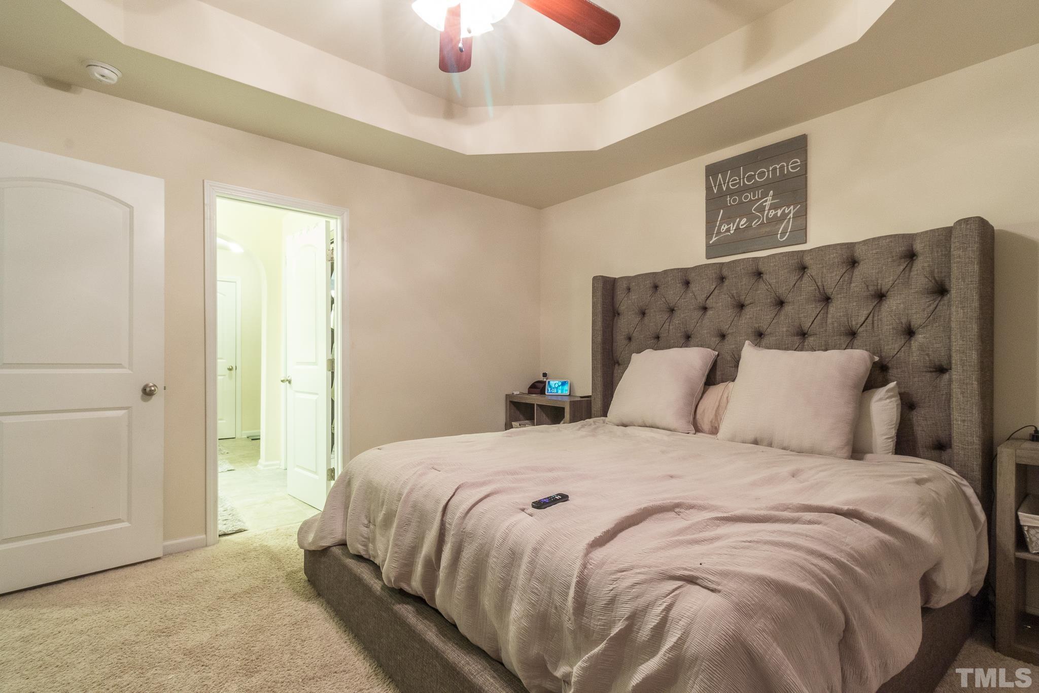 9110 Wooden Road Raleigh, NC 27617 - Photo 15 of 27 Master bedroom with trey ceiling