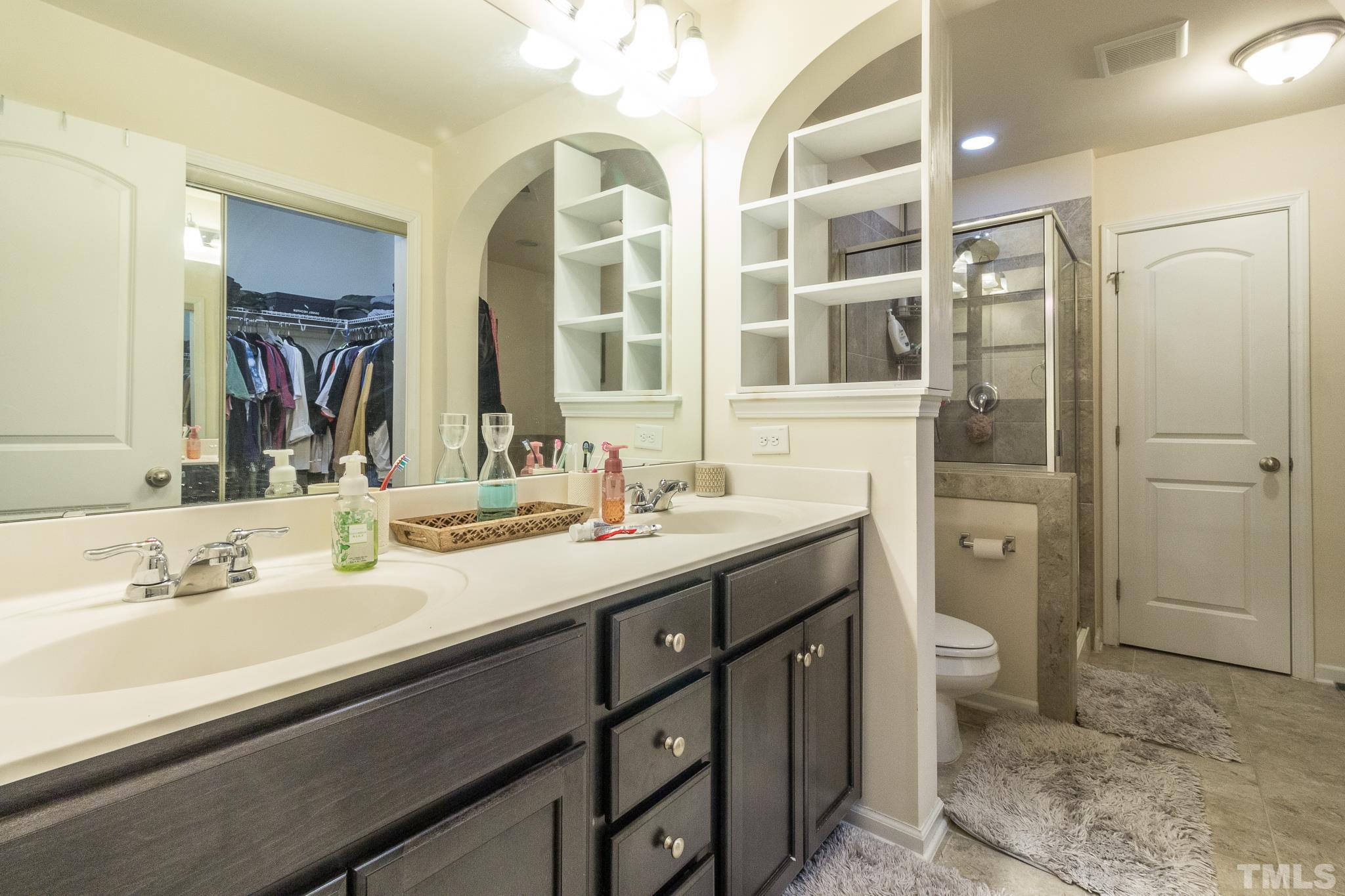 9110 Wooden Road Raleigh, NC 27617 - Photo 8 of 27 Mater Bath with separate tub and shower, and extra large closet