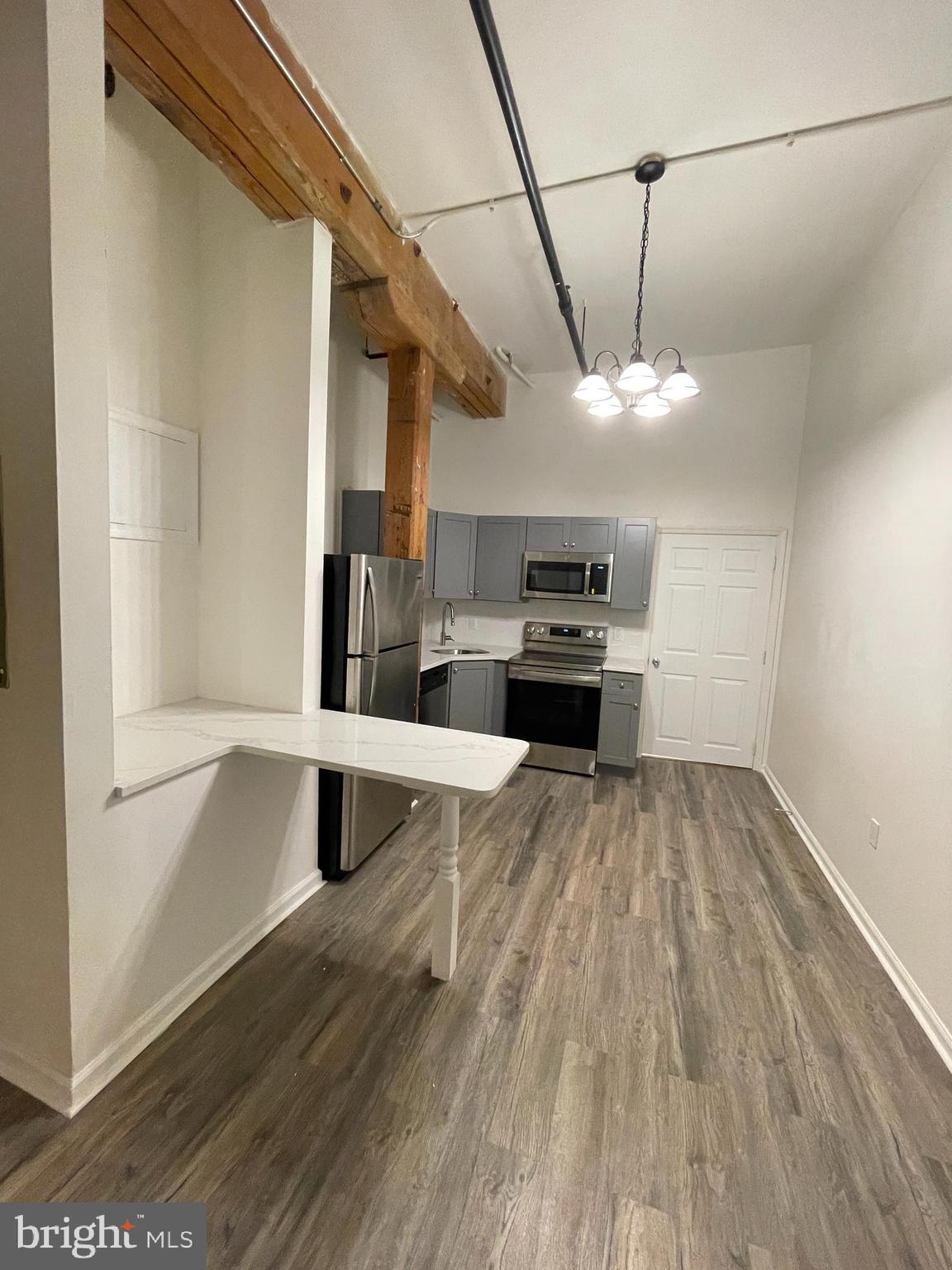 1020 Hamilton Street, Unit 4 Philadelphia, PA 19123 - Photo 15 of 19 a room with natural light and wooden floor
