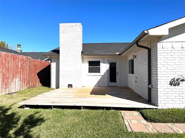 a house view with a outdoor space