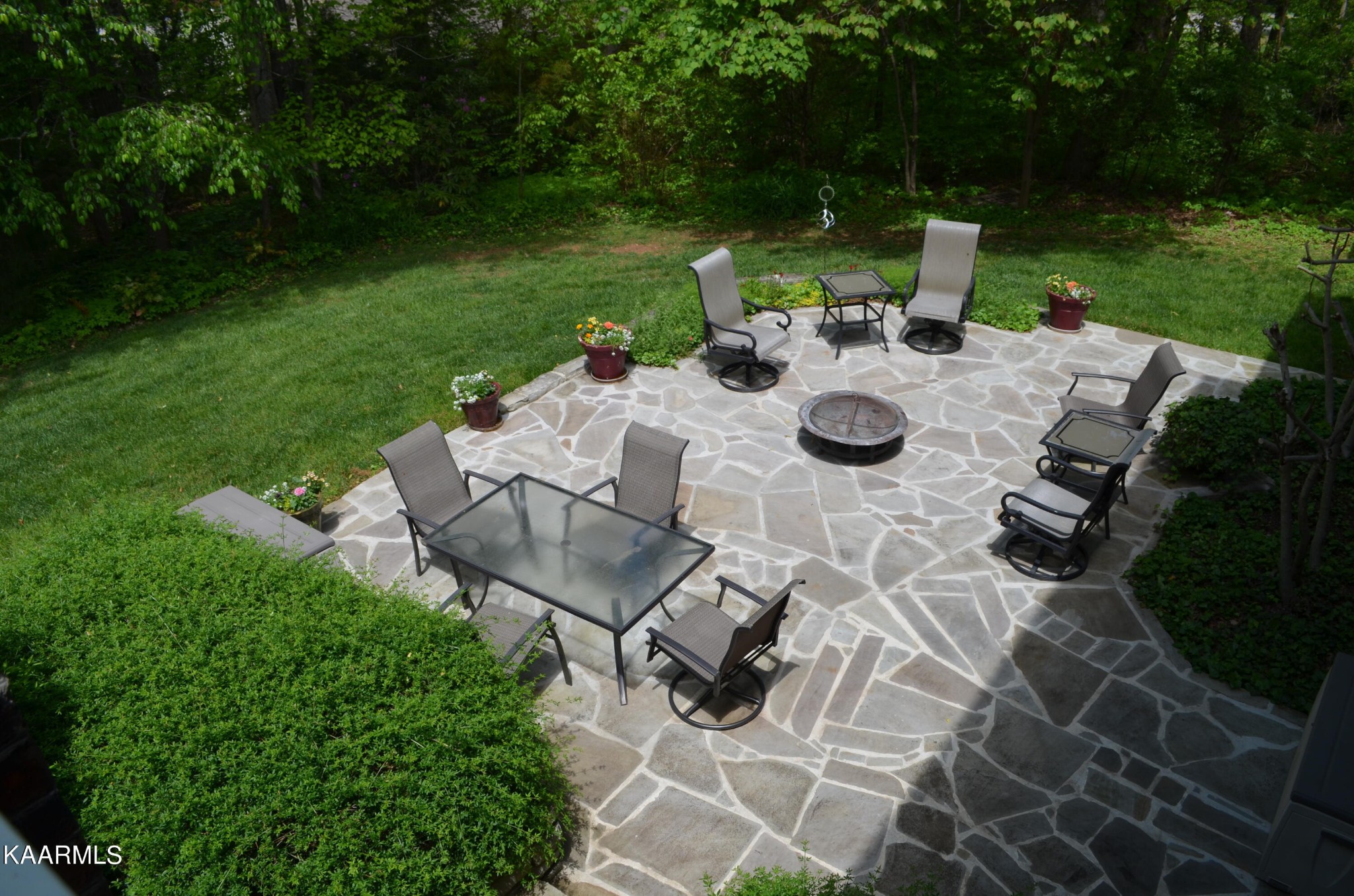 111 Dover Lane Oak Ridge, TN 37830 - Photo 14 of 60 a view of backyard with sitting area and garden