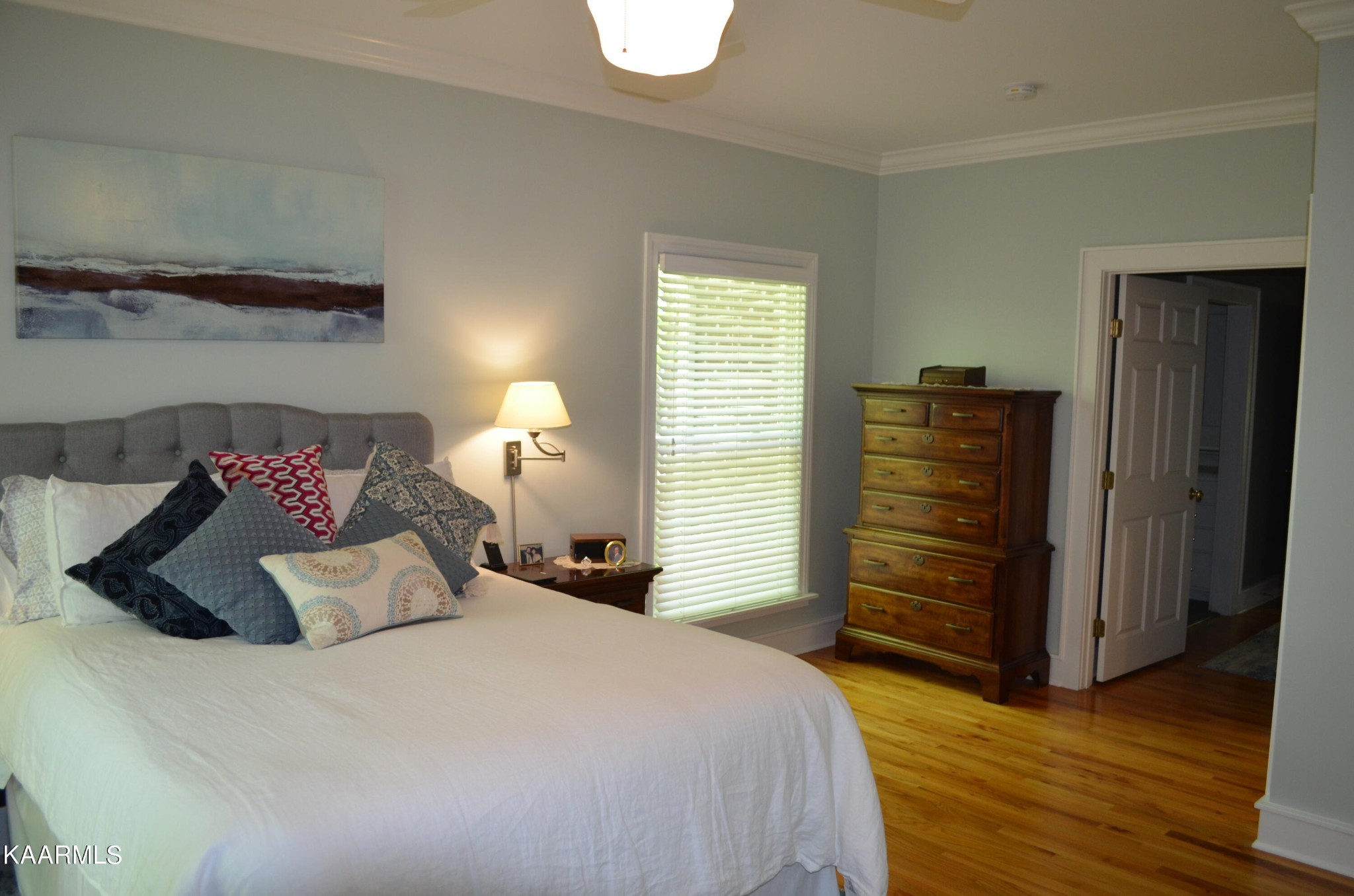 111 Dover Lane Oak Ridge, TN 37830 - Photo 26 of 60 a bedroom with a bed and wooden floor
