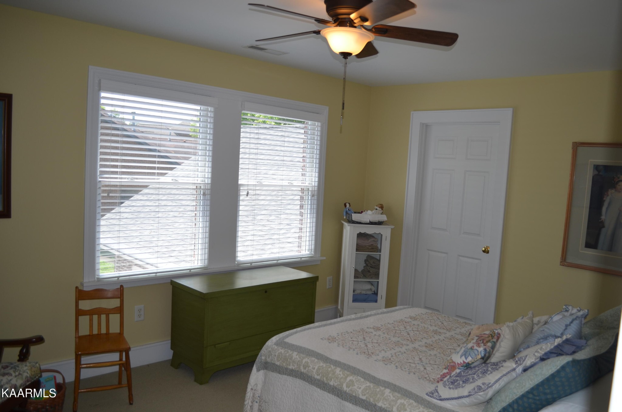 111 Dover Lane Oak Ridge, TN 37830 - Photo 50 of 60 a bedroom with a bed and a window