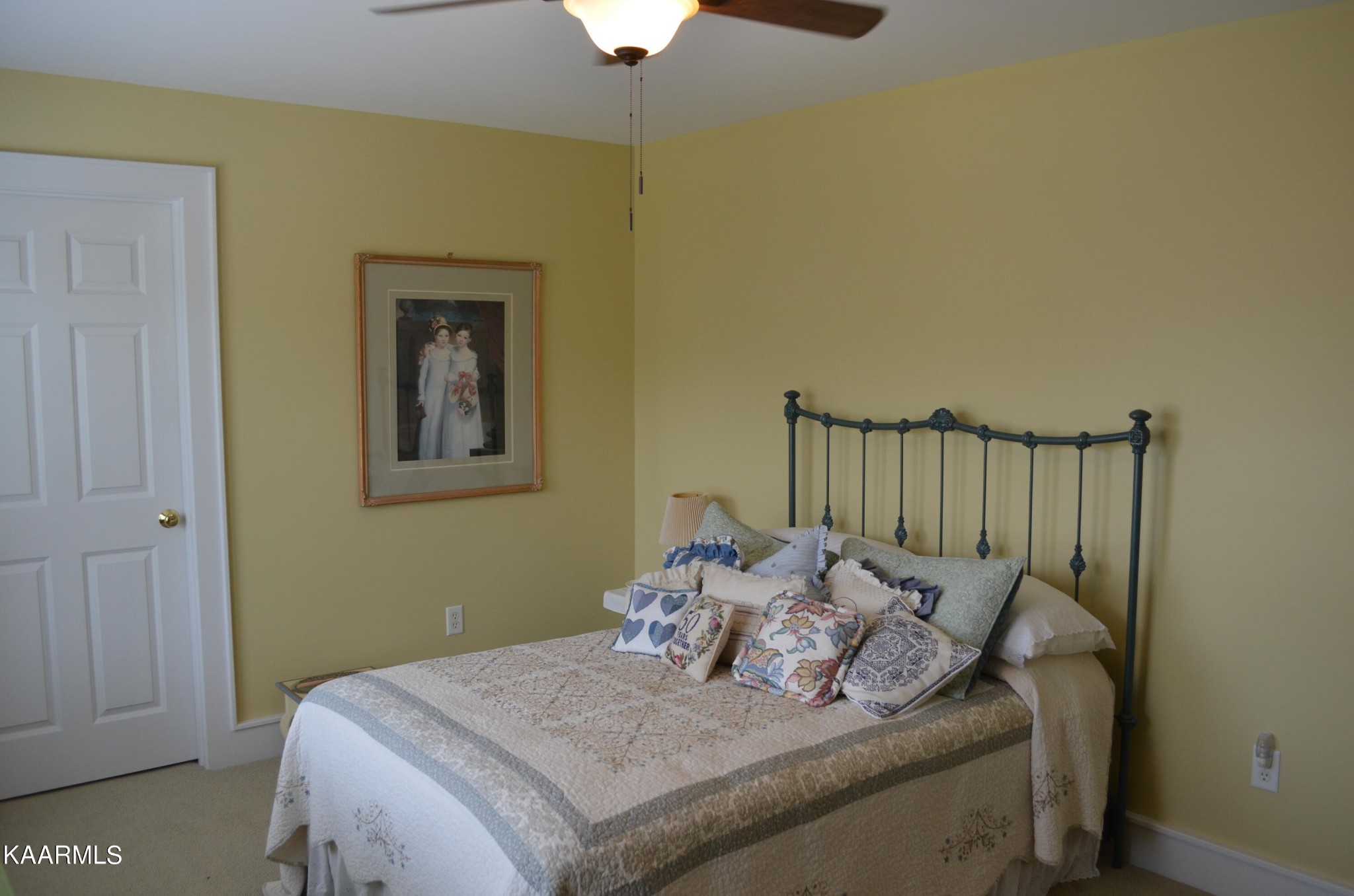 111 Dover Lane Oak Ridge, TN 37830 - Photo 51 of 60 a bed sitting in a bedroom next to a window