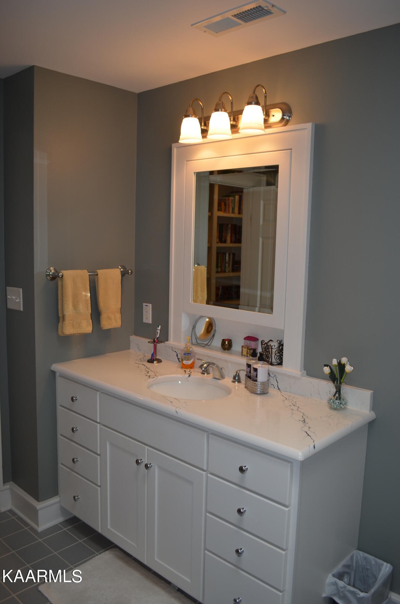 111 Dover Lane Oak Ridge, TN 37830 - Photo 56 of 60 a bathroom with a double vanity sink and a mirror