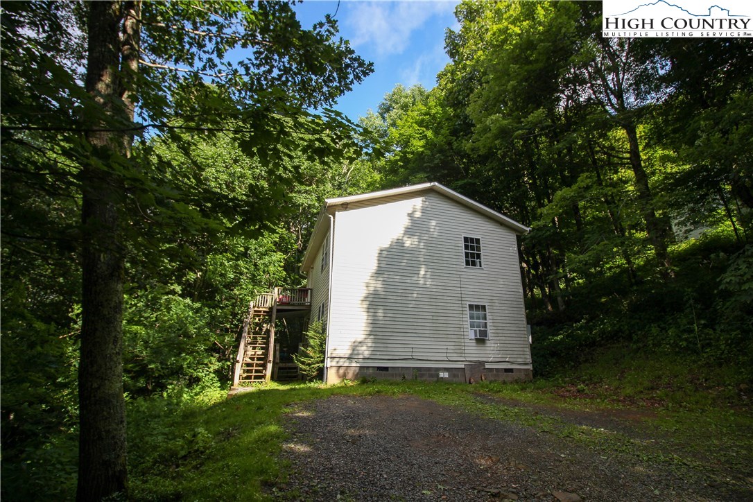 367 Sugarloaf Road Boone, NC 28607 - Photo 2 of 15 a view of a house with backyard