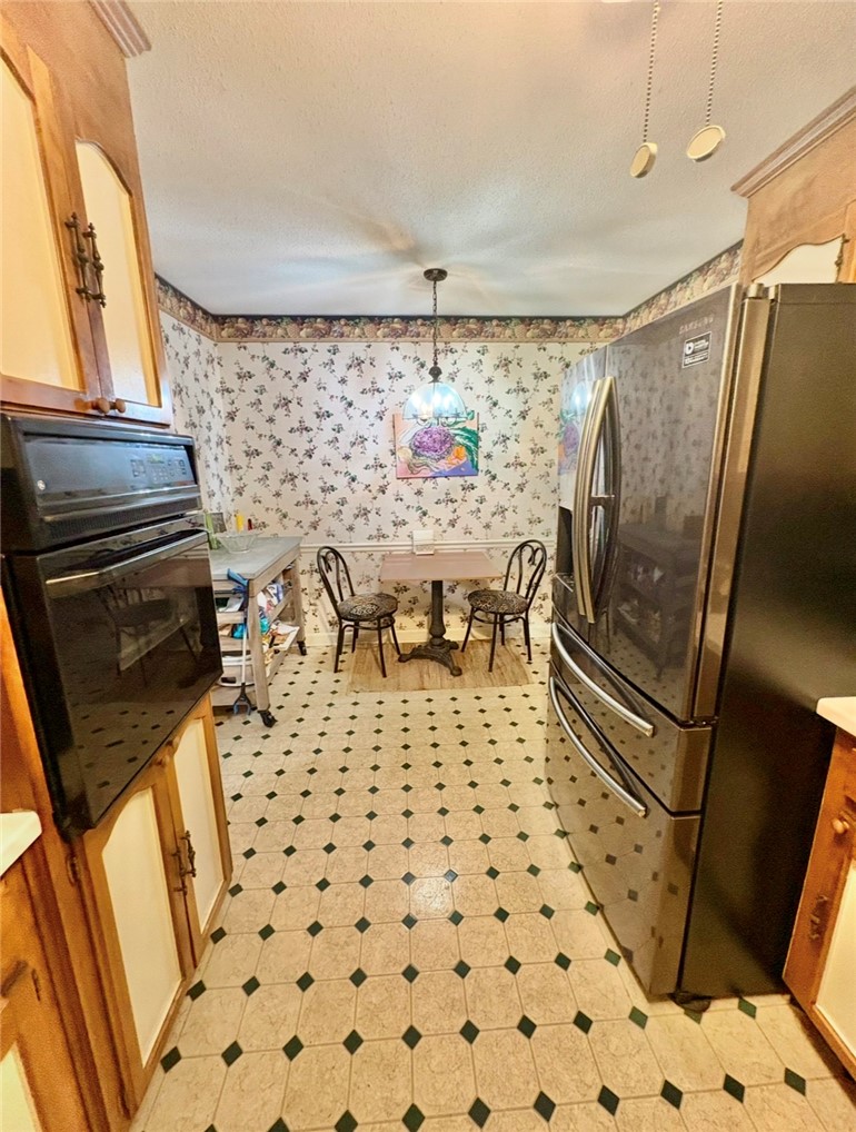 402 Loblolly Drive Anderson, SC 29625 - Photo 12 of 43 This charming kitchen features patterned flooring and provides a cozy dining nook.