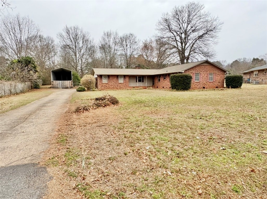 402 Loblolly Drive Anderson, SC 29625 - Photo 2 of 43 This charming brick ranch-style home offers comfort and timeless appeal, nestled on a generous lot.