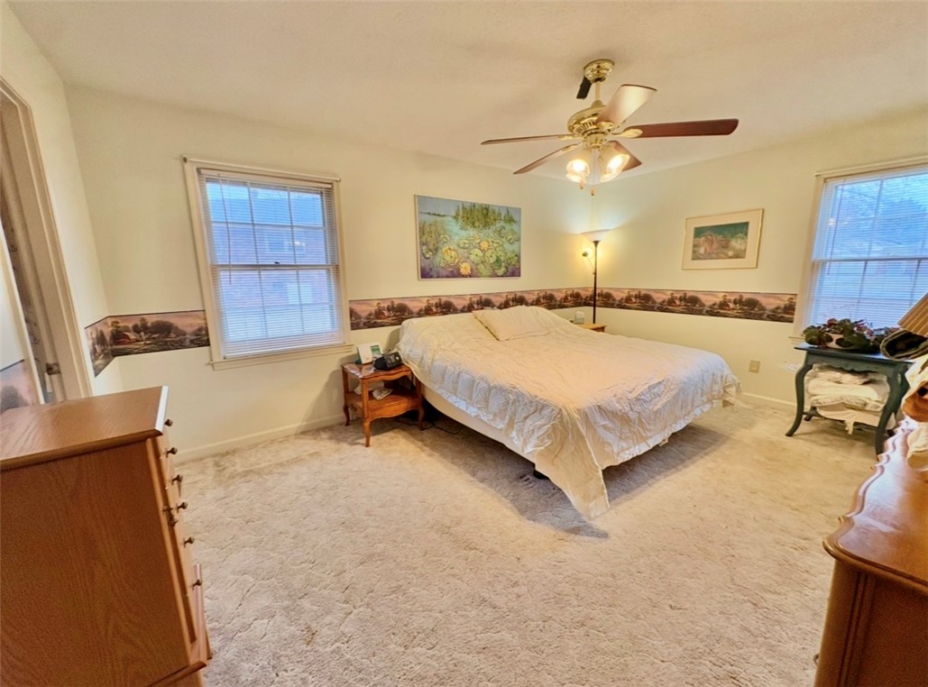 402 Loblolly Drive Anderson, SC 29625 - Photo 24 of 43 This inviting bedroom features a cozy ambiance perfect for relaxation and peaceful nights.