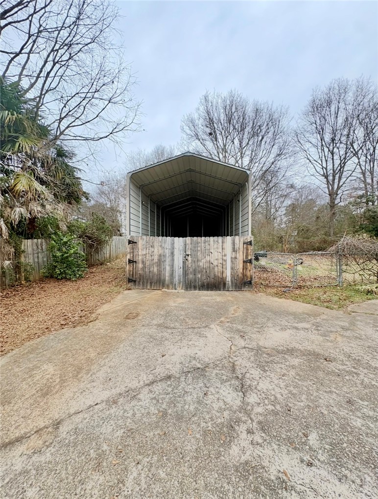 402 Loblolly Drive Anderson, SC 29625 - Photo 37 of 43 This property features a spacious RV carport, providing ample sheltered parking.