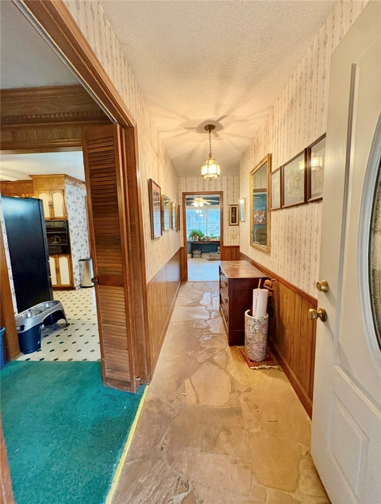 402 Loblolly Drive Anderson, SC 29625 - Photo 5 of 43 This inviting hallway features classic design elements, creating a warm and welcoming entrance.