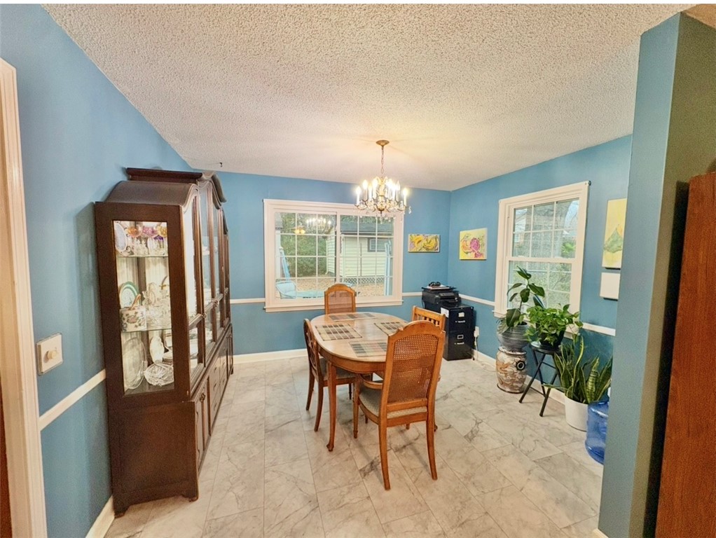 402 Loblolly Drive Anderson, SC 29625 - Photo 8 of 43 This dining area showcases classic details and ample natural light, perfect for gatherings.