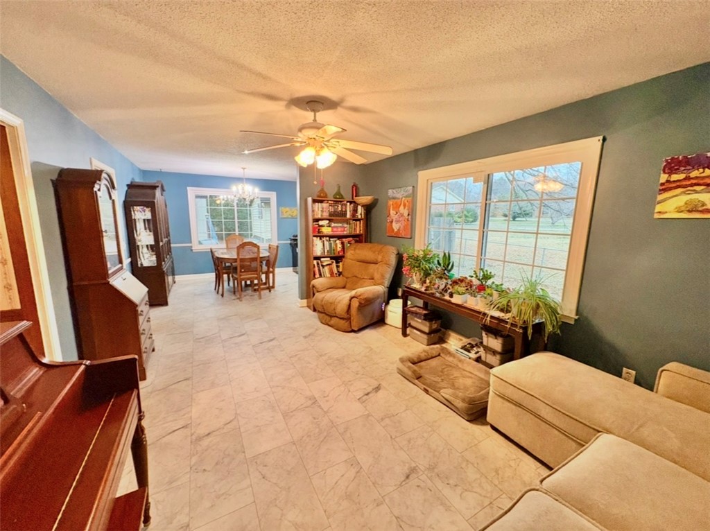 402 Loblolly Drive Anderson, SC 29625 - Photo 10 of 43 This inviting space features durable tile flooring, providing comfort and easy maintenance for daily living.