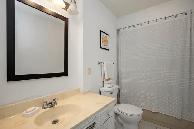 a view of a room with wooden walls