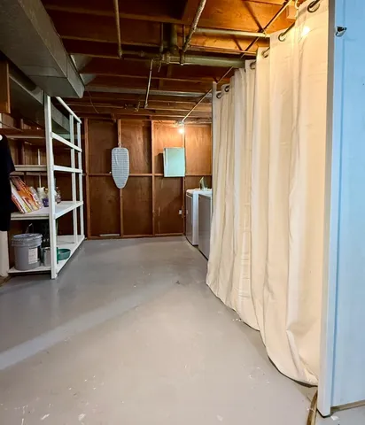 an outdoor space with furniture and garden