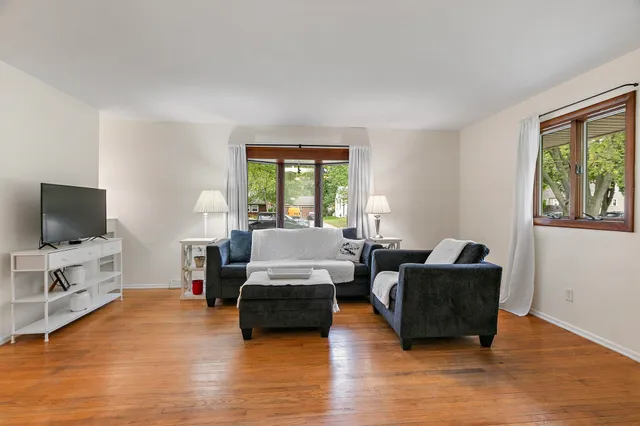 a kitchen with a sink stove and microwave