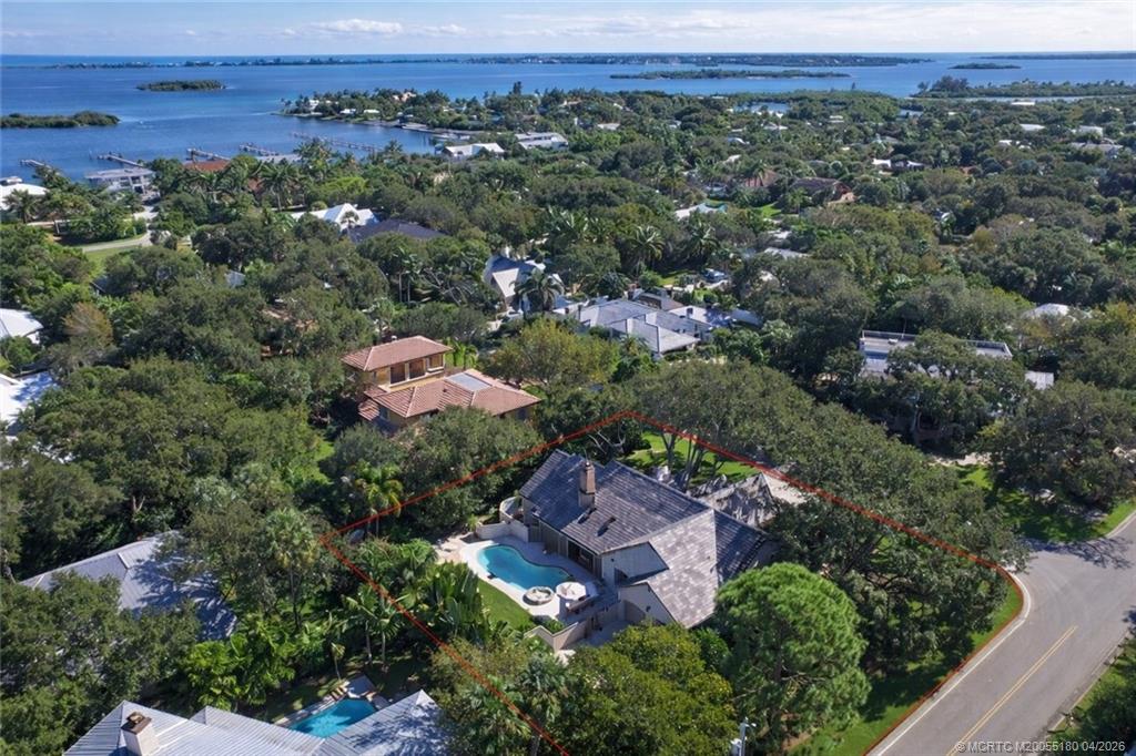 10 Pineapple Lane Stuart, FL 34996 - Photo 2 of 9 an aerial view of a city with lots of residential buildings