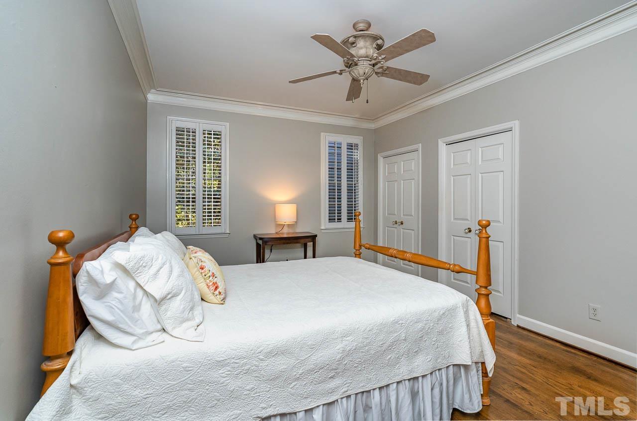 2625 Ashland Street Raleigh, NC 27608 - Photo 17 of 26 a bedroom with a bed and a window