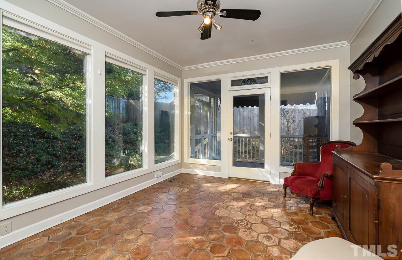 2625 Ashland Street Raleigh, NC 27608 - Photo 24 of 26 a living room with furniture and a large window