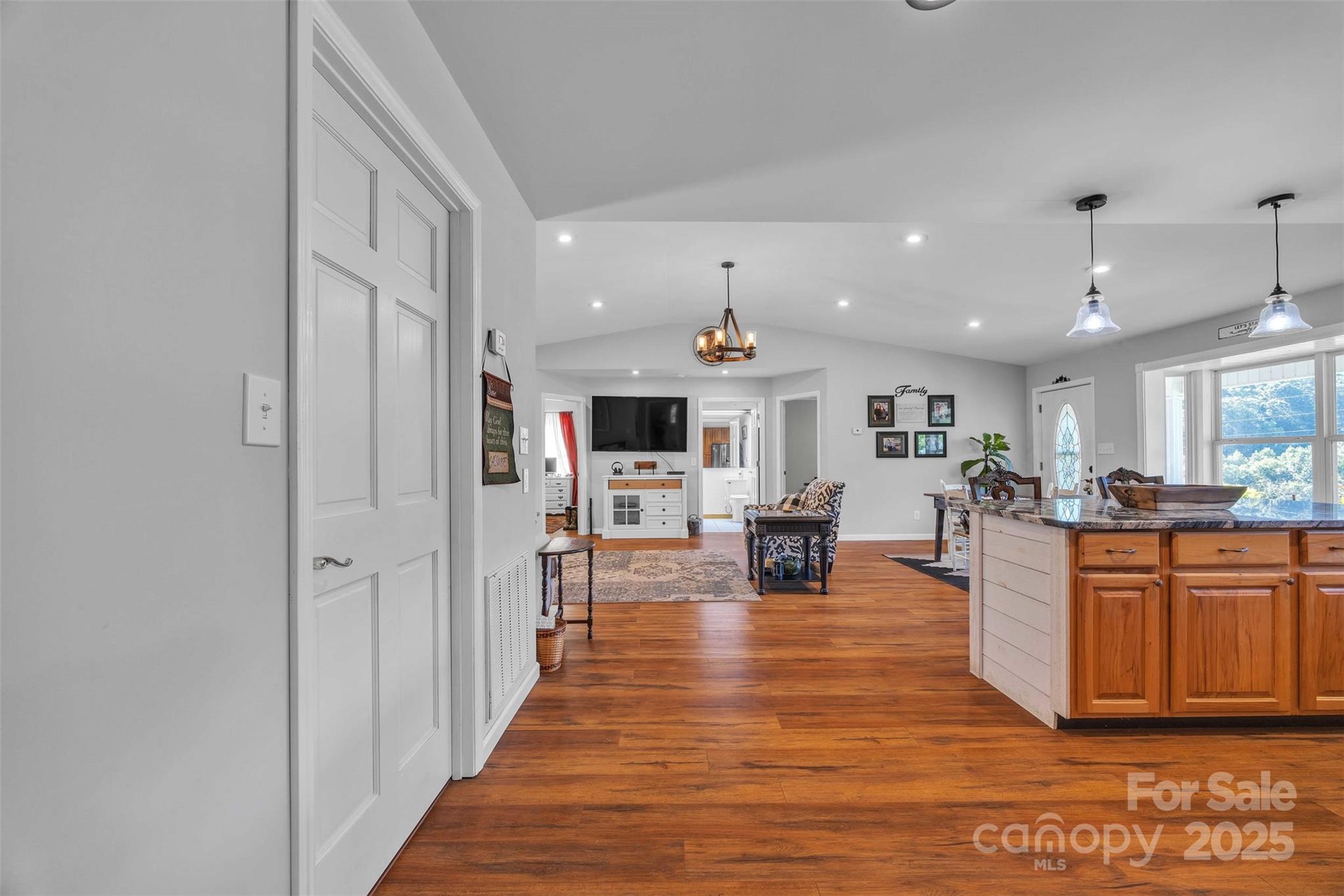 5158 Jenkins Road Morganton, NC 28655 - Photo 18 of 40 a view of living room kitchen with stainless steel appliances granite countertop lots of counter top space