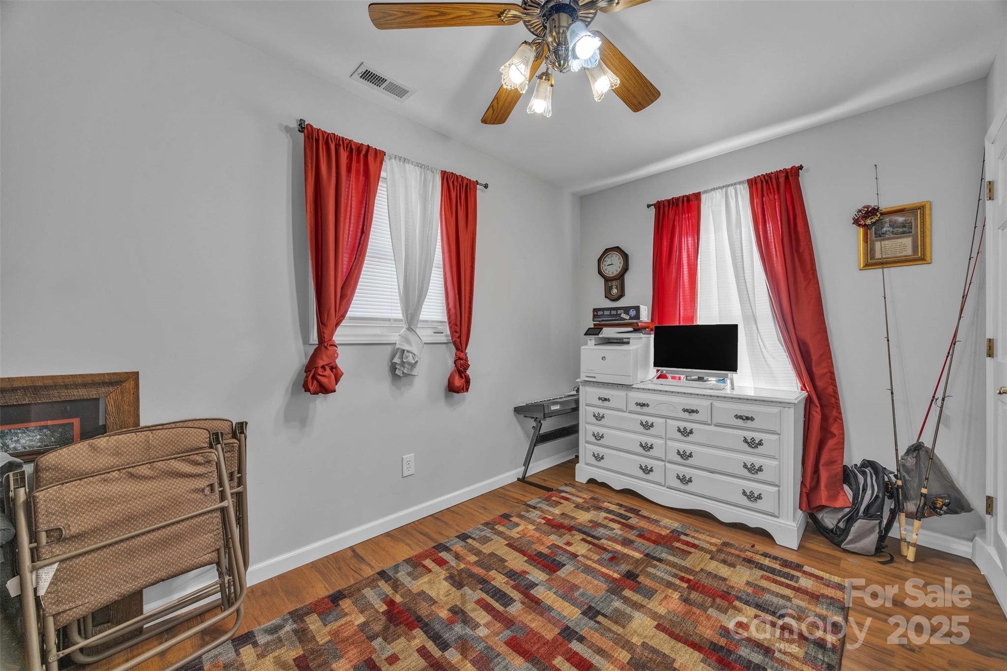 5158 Jenkins Road Morganton, NC 28655 - Photo 25 of 40 a bedroom with a bed and a flat tv screen