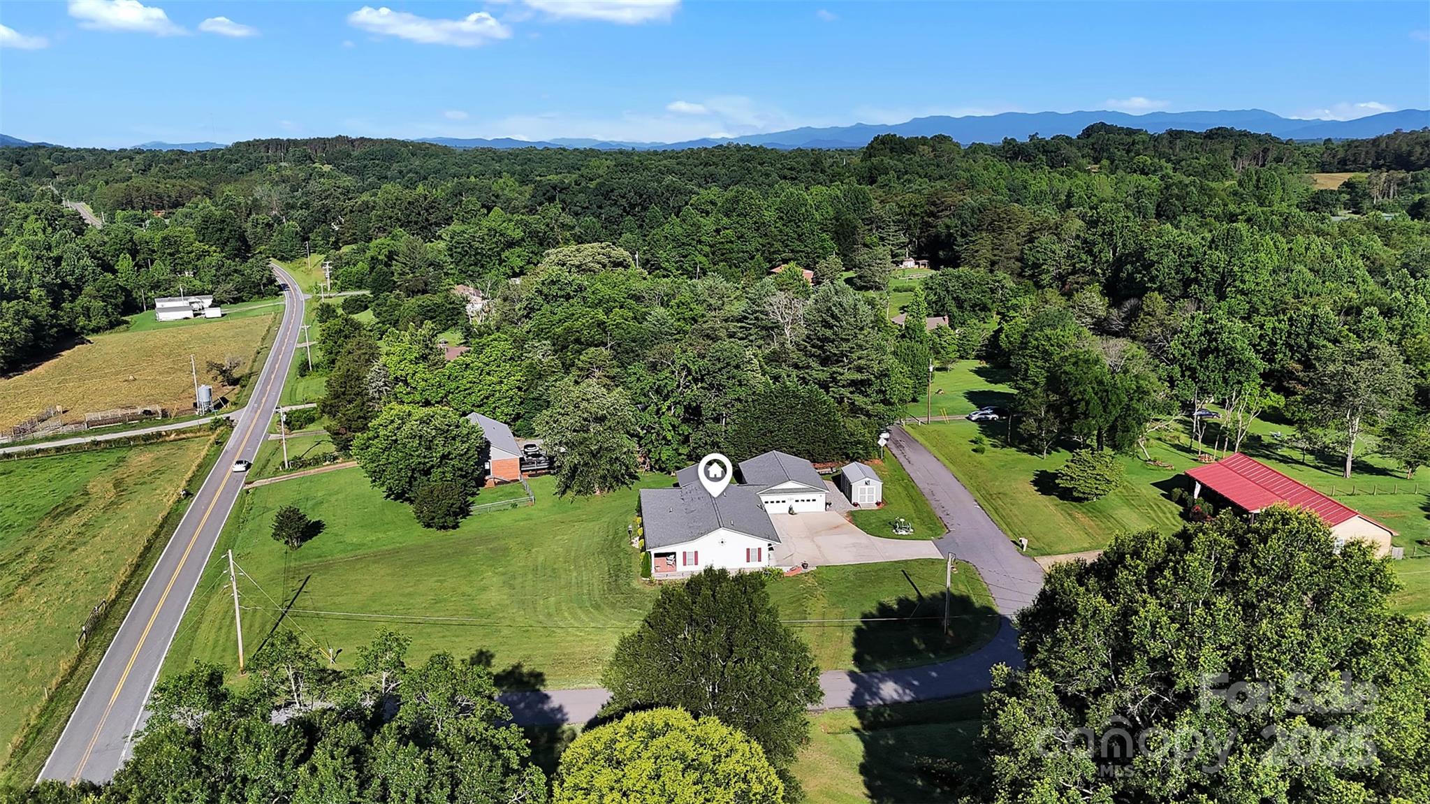 5158 Jenkins Road Morganton, NC 28655 - Photo 5 of 40 an aerial view of a houses with a yard