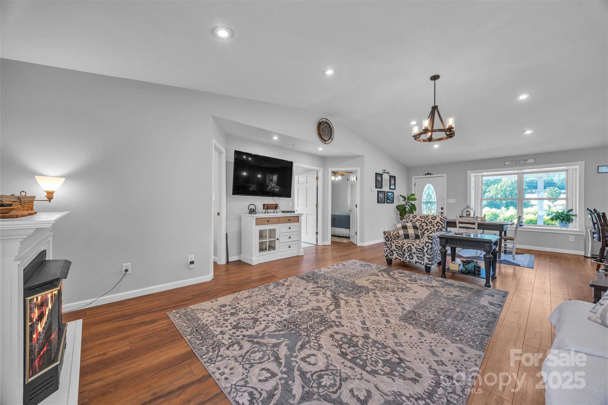5158 Jenkins Road Morganton, NC 28655 - Photo 9 of 40 a living room with furniture and a flat screen tv