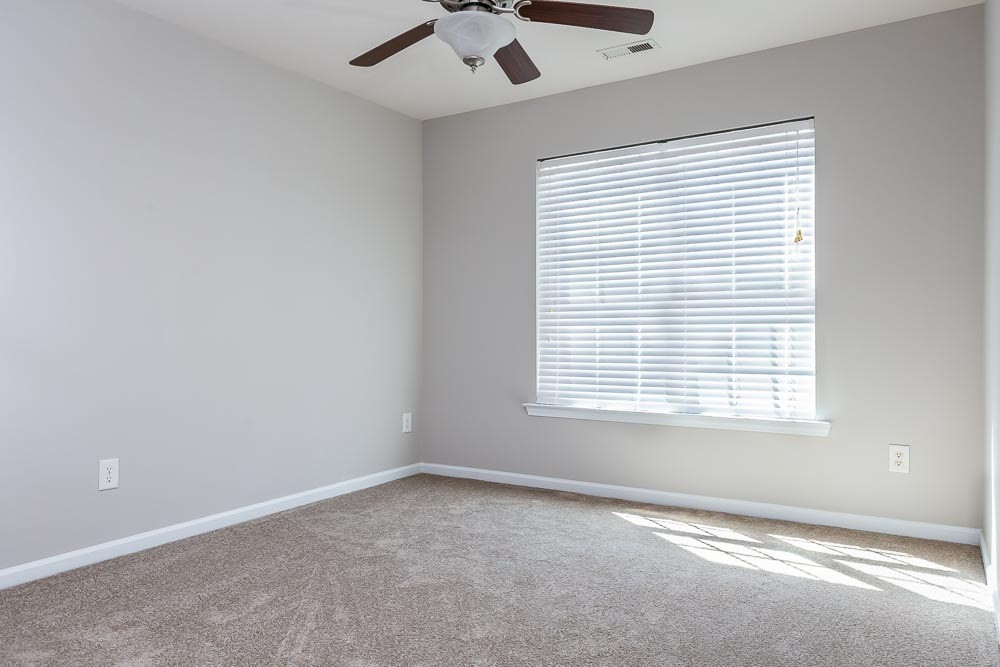 8722 Owl Roost Place Raleigh, NC 27617 - Photo 18 of 26 Like the whole home, freshly painted with neutral gray and pristine white trim. Bedroom 2