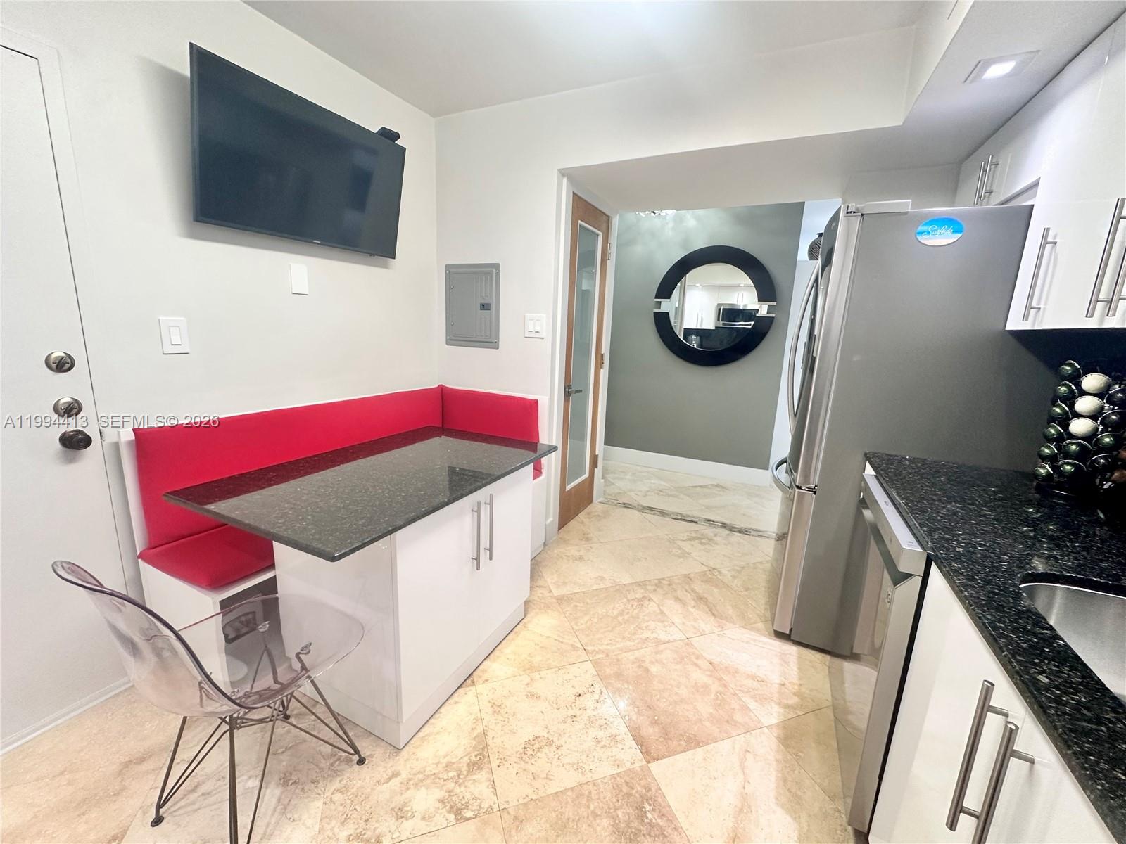9225 Collins Avenue, Unit 1111 Surfside, FL 33154 - Photo 15 of 54 a living room with furniture