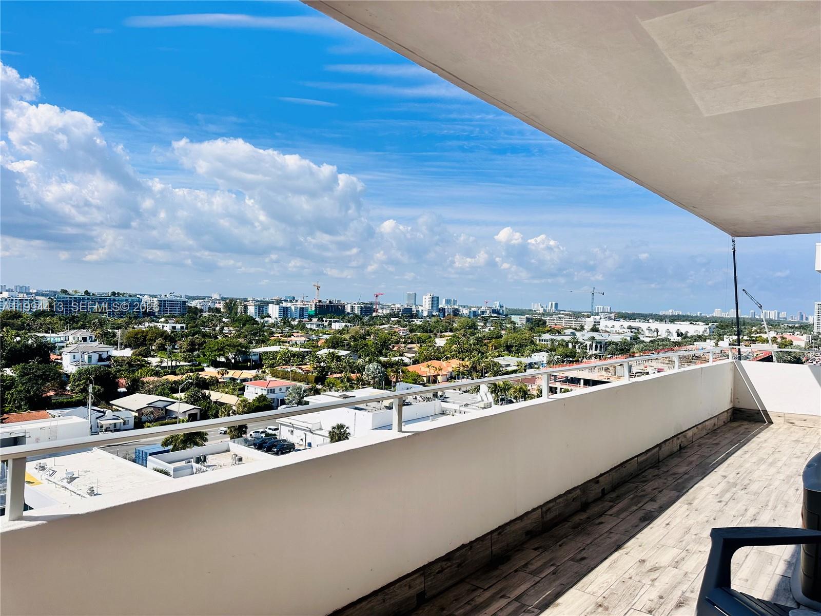 9225 Collins Avenue, Unit 1111 Surfside, FL 33154 - Photo 36 of 54 a view of city from a balcony