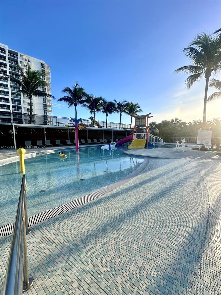 9225 Collins Avenue, Unit 1111 Surfside, FL 33154 - Photo 48 of 54 swimming pool view with a outdoor space