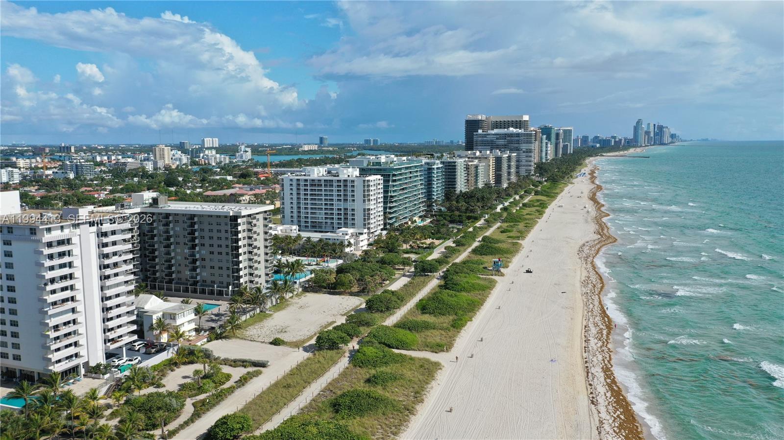 9225 Collins Avenue, Unit 1111 Surfside, FL 33154 - Photo 54 of 54 a view of a city with tall buildings