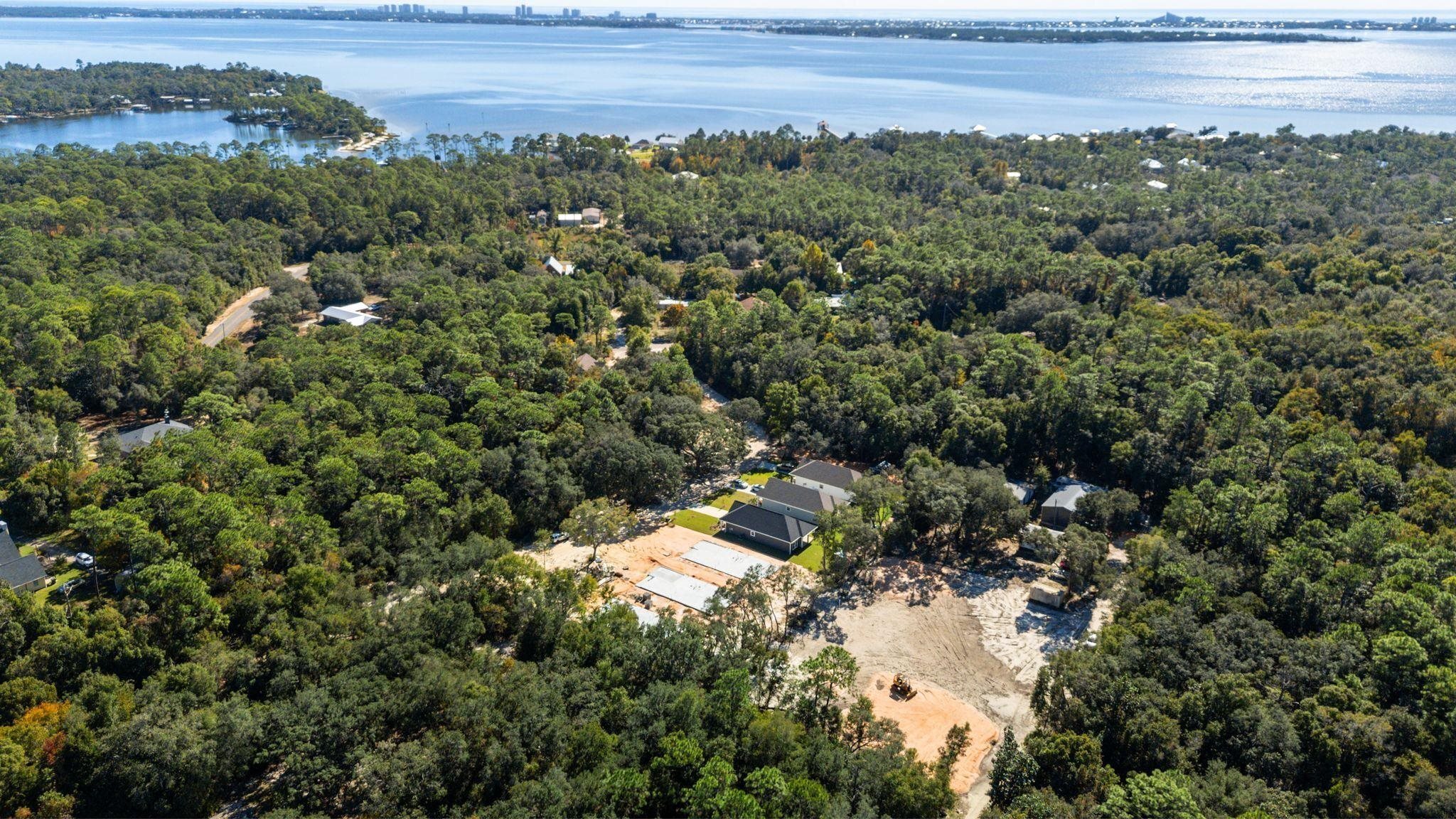 8657 Anniston Drive Elberta, AL 36530 - Photo 16 of 21 Bird's eye view of a heavily wooded area and a large body of water