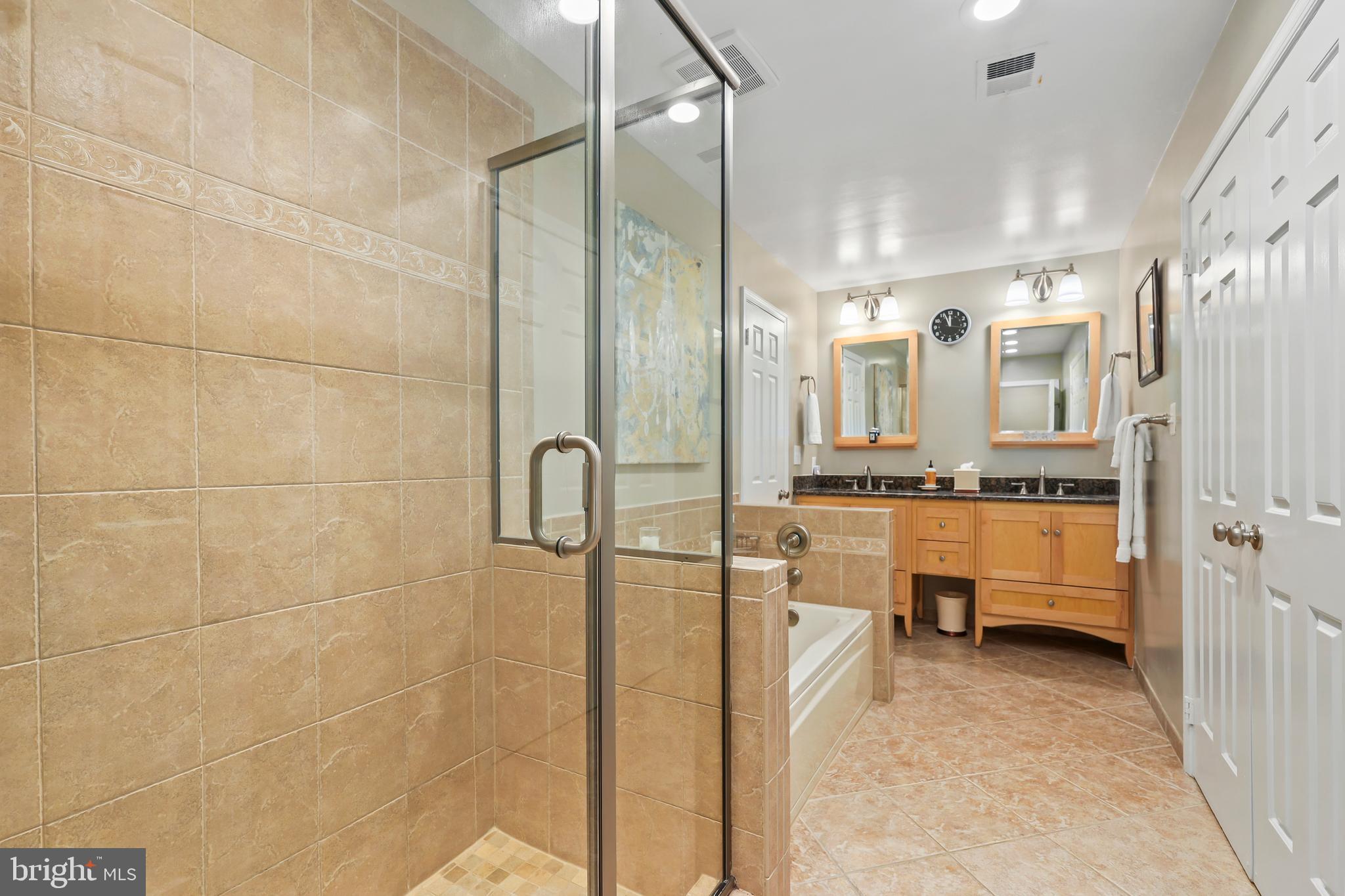5024 Pheasant Ridge Road Fairfax, VA 22030 - Photo 26 of 51 Primary Ensuite with Shower and Soaking Tub
