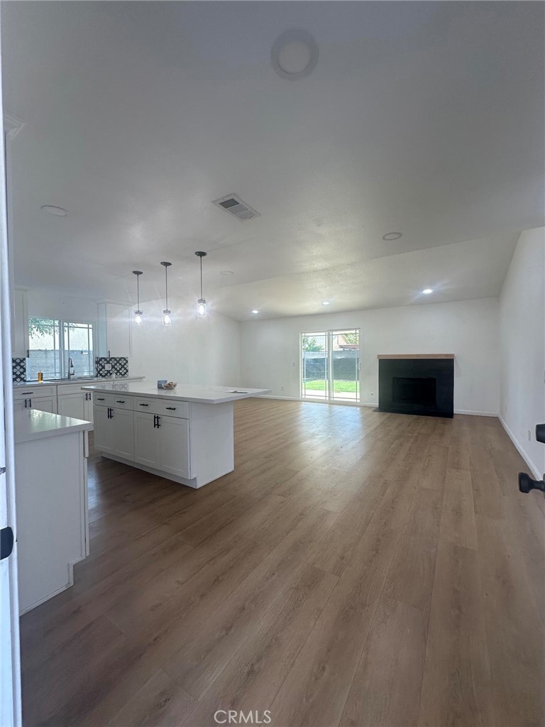 2014 Iris Way Hemet, CA 92545 - Photo 2 of 10 a view of empty room with wooden floor