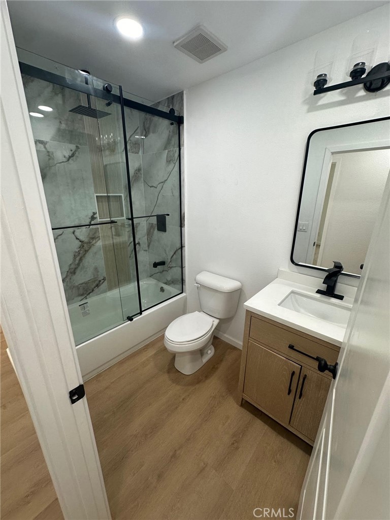 2014 Iris Way Hemet, CA 92545 - Photo 4 of 5 a bathroom with a sink toilet and shower