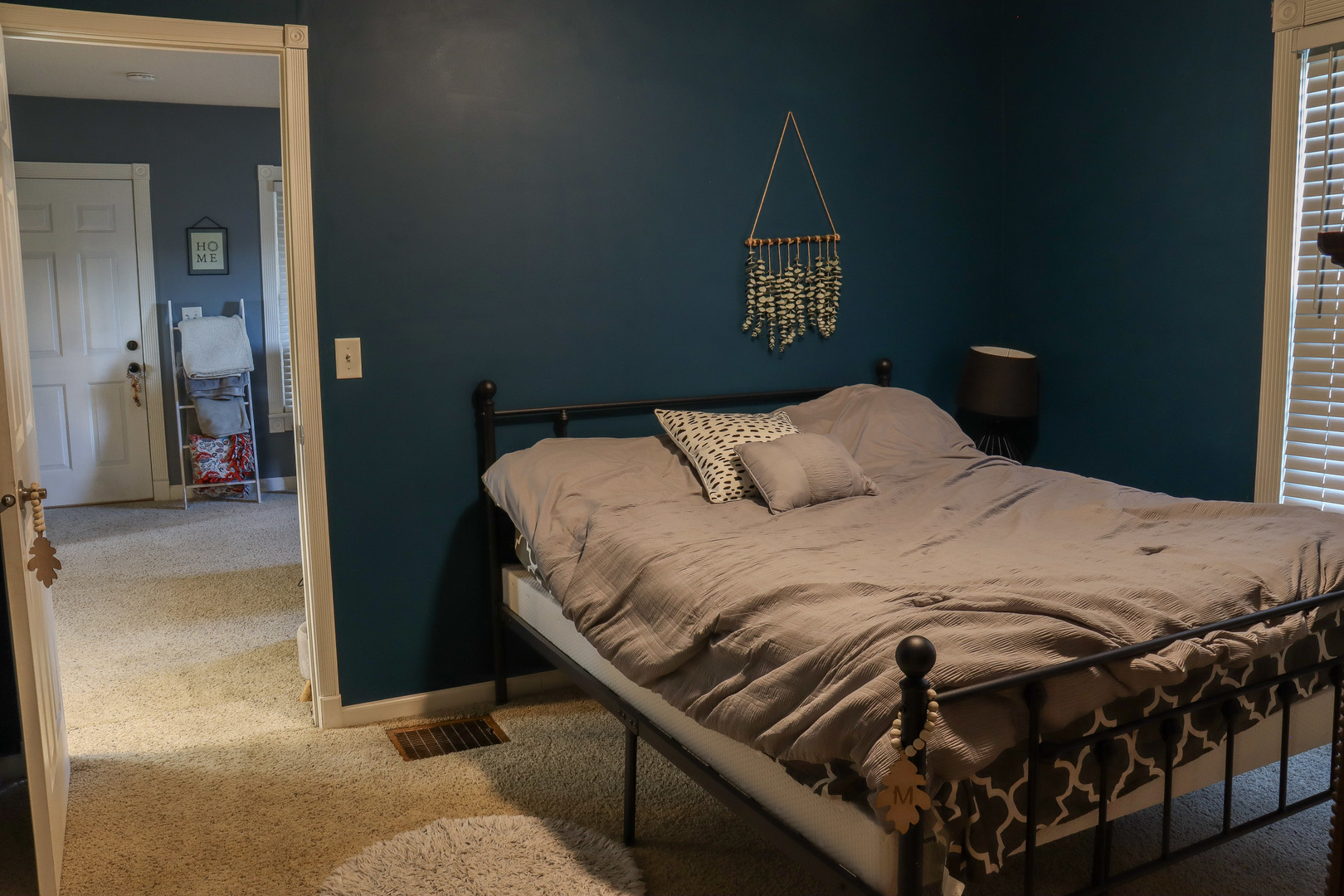 102 South Jackson Street Morrison, IL 61270 - Photo 15 of 29 a bedroom with a bed and a mirror