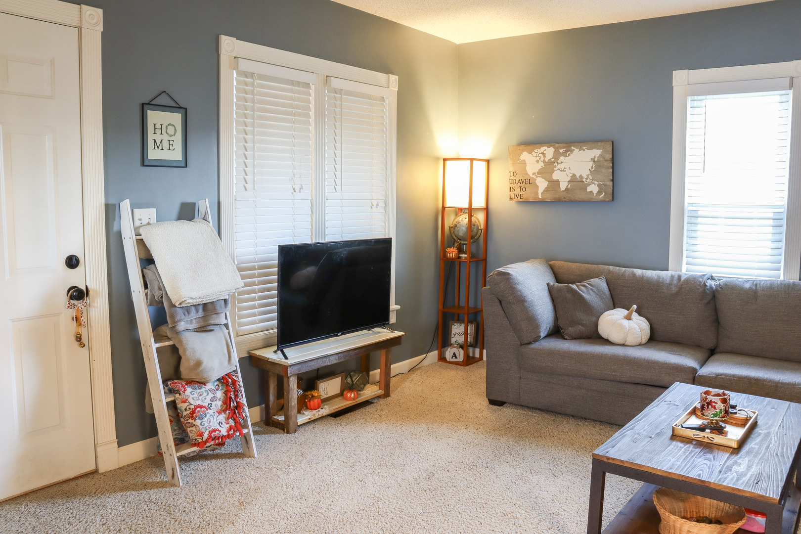 102 South Jackson Street Morrison, IL 61270 - Photo 6 of 29 a living room with furniture and a flat screen tv