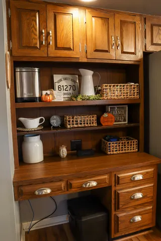 a kitchen with stainless steel appliances granite countertop a stove and a microwave