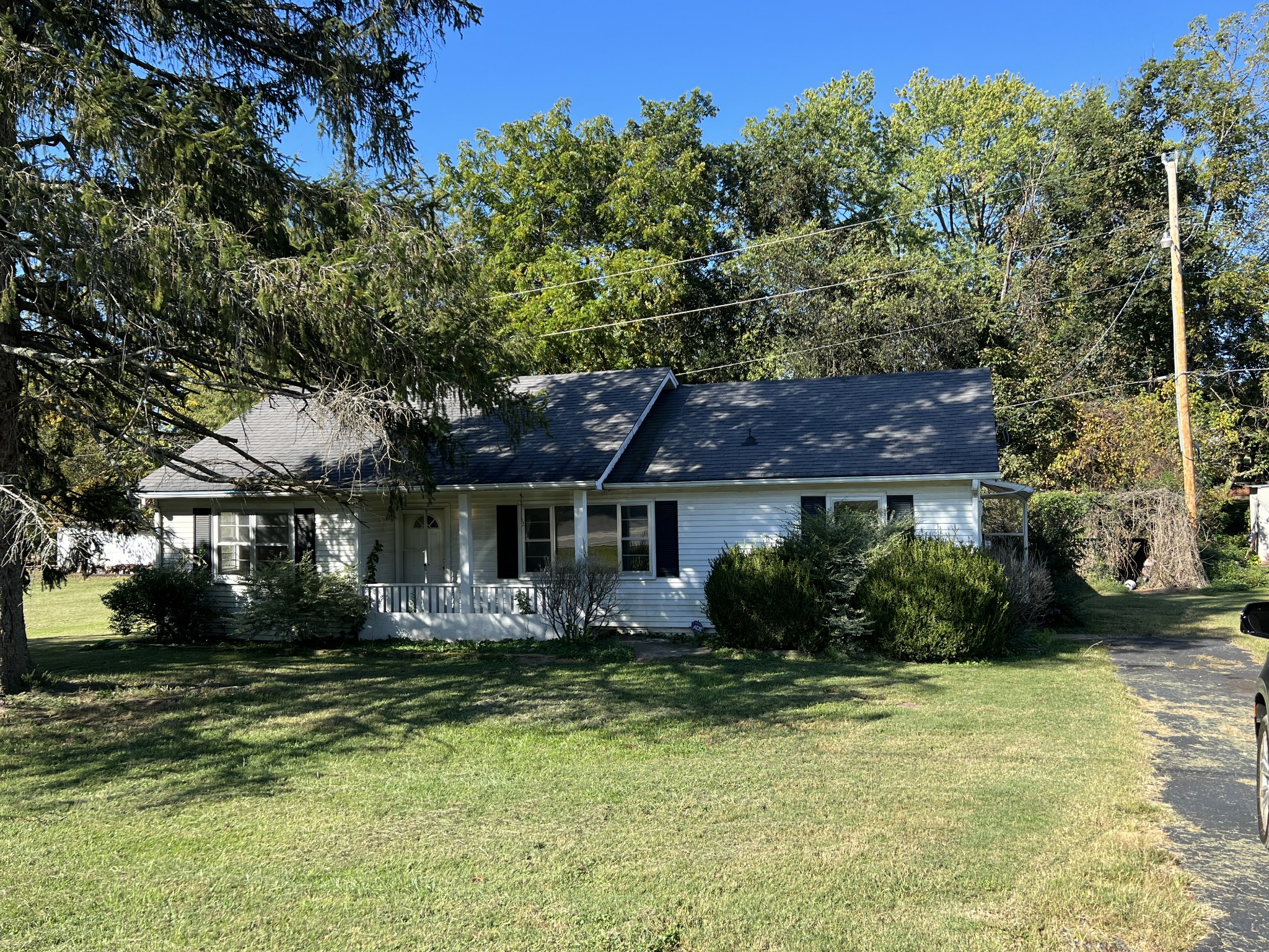 1255 Main Street Pleasant View, TN 37146 - Photo 3 of 14 a front view of house with yard and green space