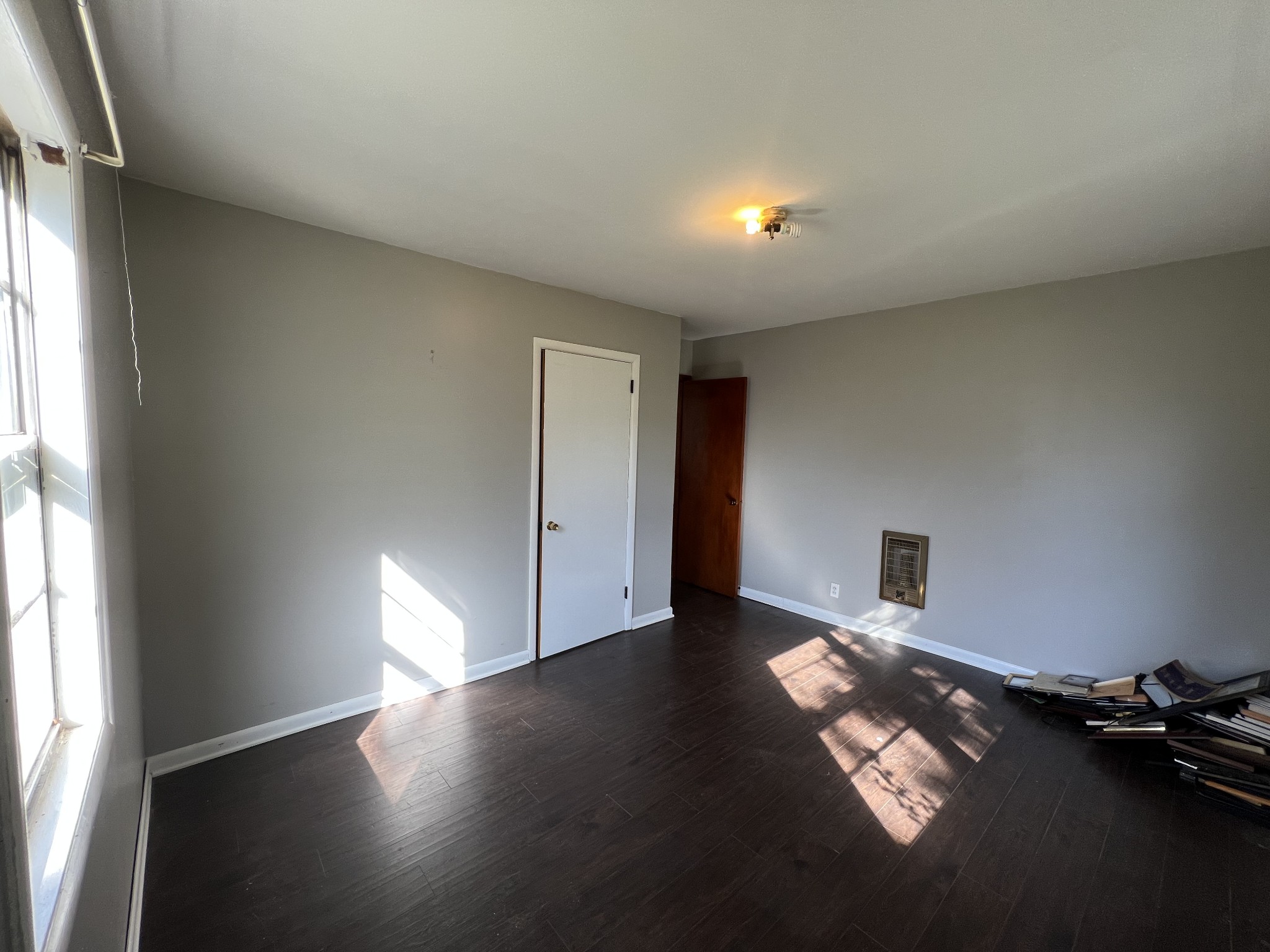 1255 Main Street Pleasant View, TN 37146 - Photo 8 of 14 wooden floor in an empty room with a window