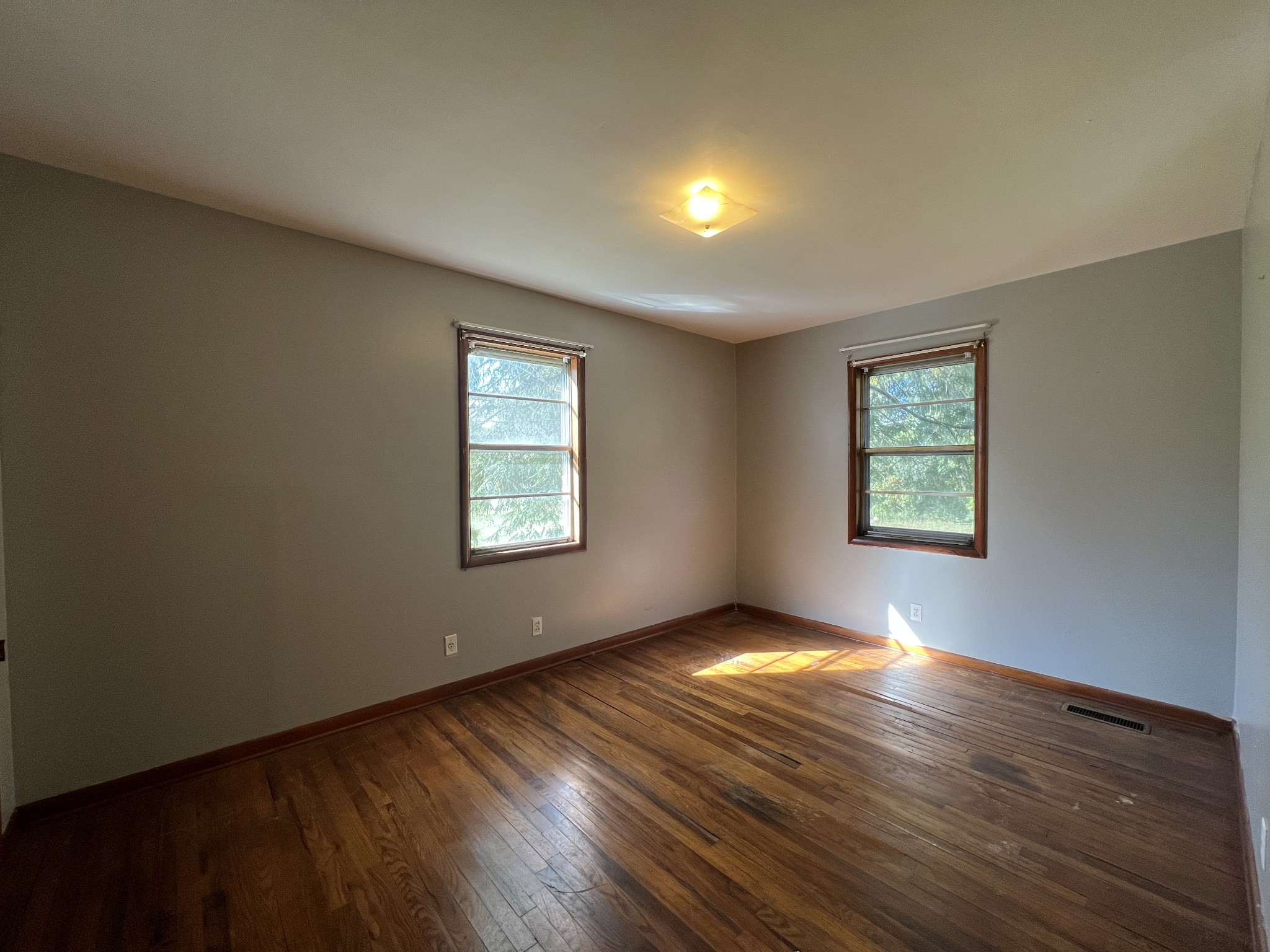 1255 Main Street Pleasant View, TN 37146 - Photo 10 of 14 an empty room with windows