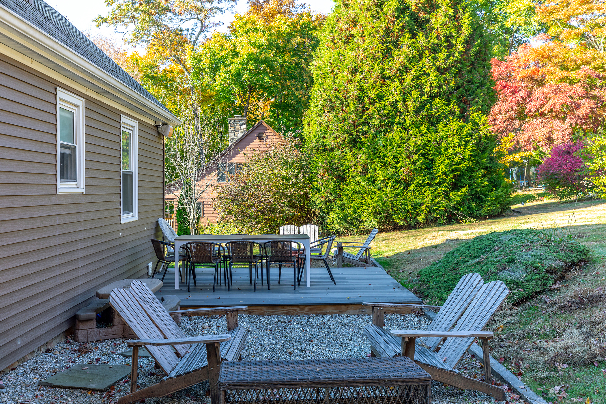 5 Windmill Road New Fairfield, CT 06812 - Photo 26 of 37 a view of a yard with a table and chair