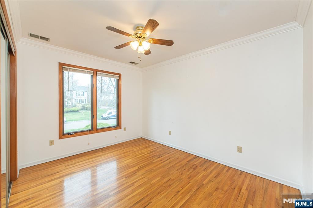 1 Old Timber Court Roxbury Township, NJ 07847 - Photo 14 of 34 a view of an empty room with wooden floor and a window