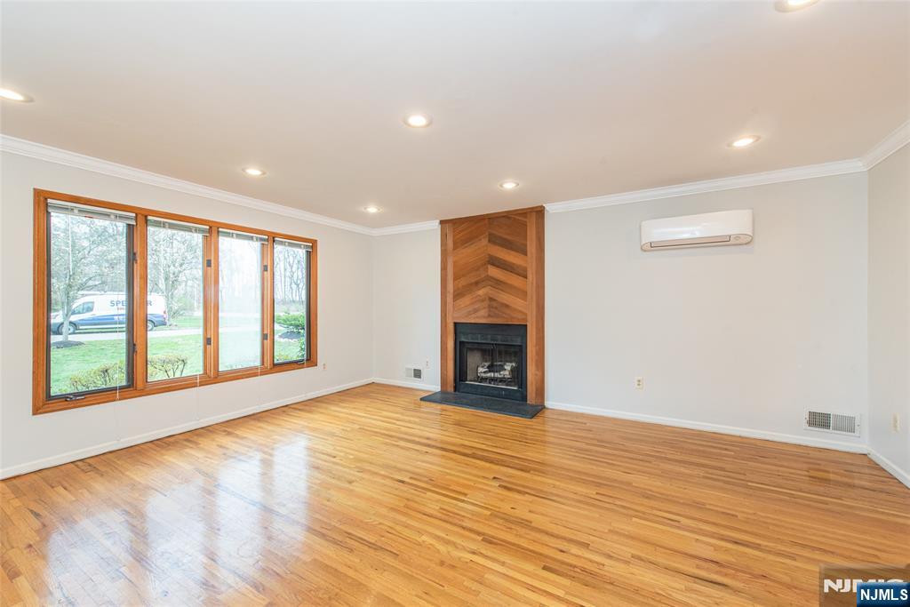 1 Old Timber Court Roxbury Township, NJ 07847 - Photo 19 of 34 a view of an empty room with a window and fireplace