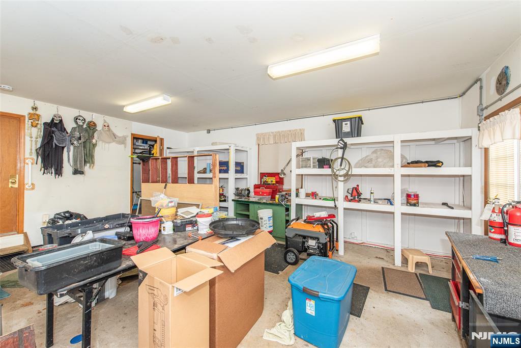 1 Old Timber Court Roxbury Township, NJ 07847 - Photo 25 of 34 a view of a workspace with furniture and a livingroom