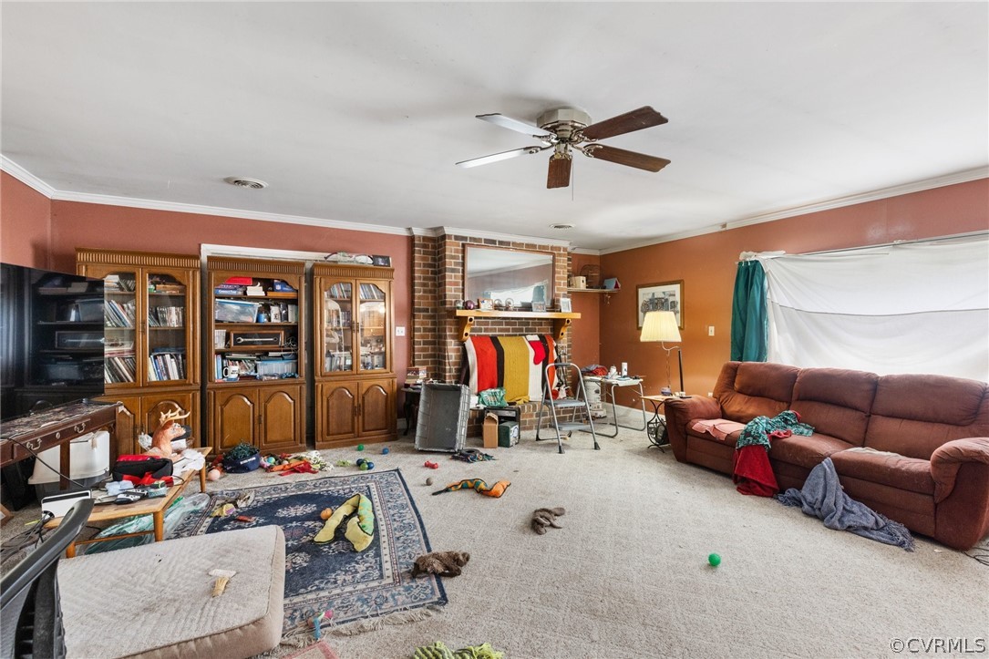 8442 Wheeling Road Mechanicsville, VA 23116 - Photo 8 of 23 a living room with lots of furniture and white walls